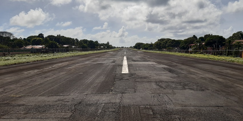 A front view of the runway of the Makin Airport, as is visible from a plane’s pilot seat.