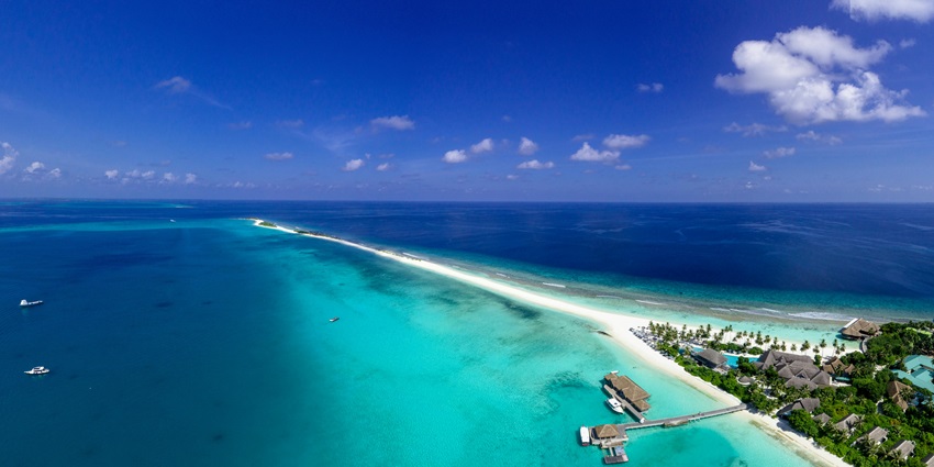 A breathtaking aerial view of stunning sandbars surrounded by crystal-clear waters.