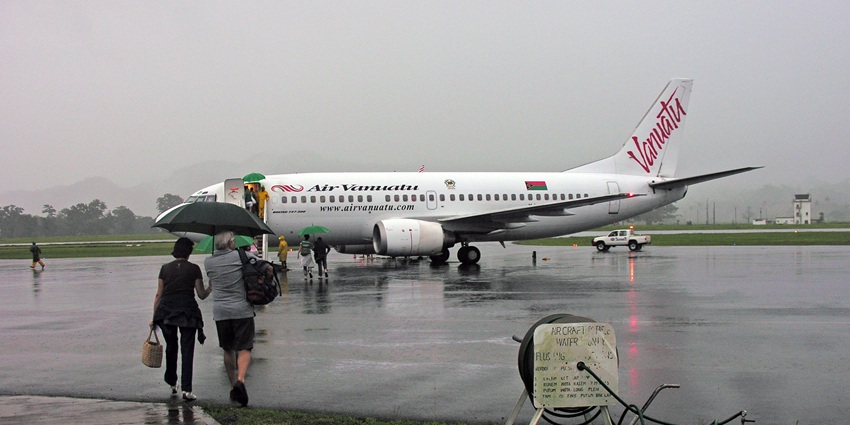 Passengers on their way to board the flight that will take them to their destination.