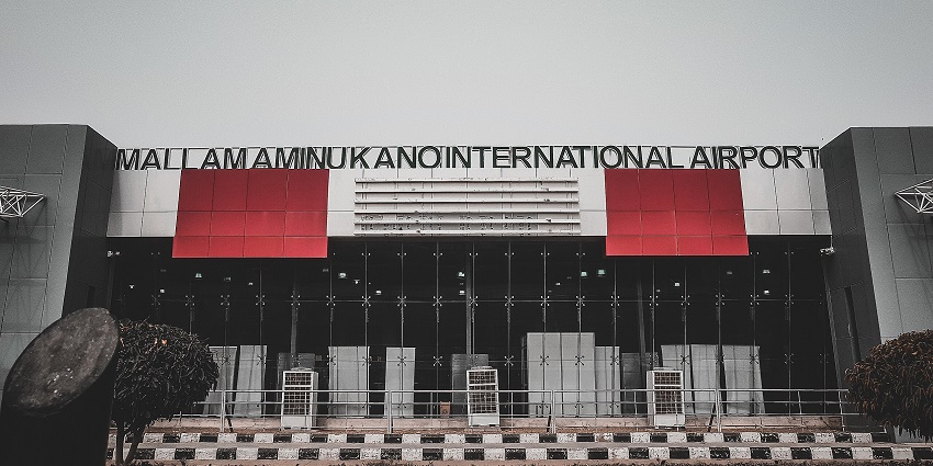 Front view of Mallam Aminu Kano International Airport with its name displayed prominently on the terminal