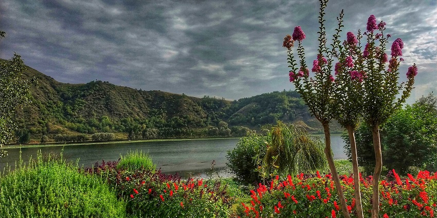 Manasbal lake with a still water body, unique flowers, mountains on the side and greenery
Viewers of this file can see comments and suggestions