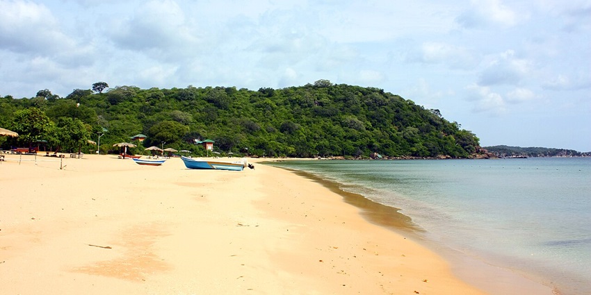 Scenic view of Marble Beach with clear blue water and sandy shoreline—places to visit in trincomalee