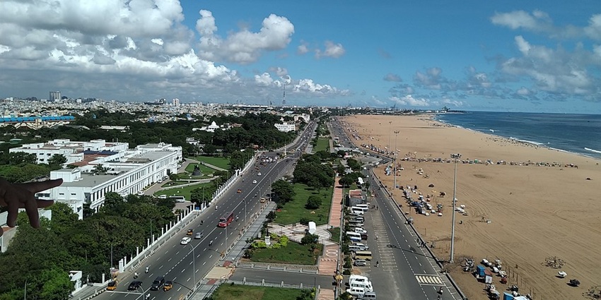 Bird's-eye view of Marina Beach, with the city road alongside the golden shores