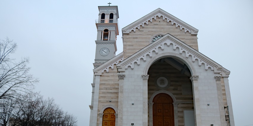 An image of a majestic Catholic cathedral in Pristina, Kosovo, dedicated to Mother Teresa