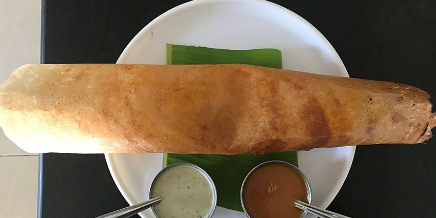 Image of crispy masala dosa with potato filling, one of the best foods in India
