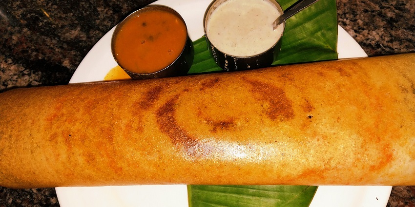 An image showing Masala Dosa, a traditional Indian street food with health benefits.