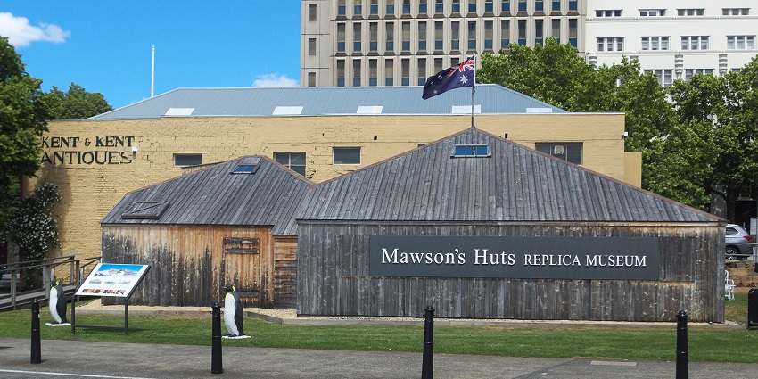 "Mawson's Huts Replica Museum" with a sledge statue, one of the educational places to visit in Hobart.