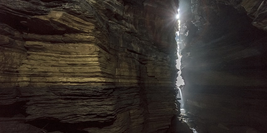 Stunning rock formations and natural textures create a mystical atmosphere in the Cave