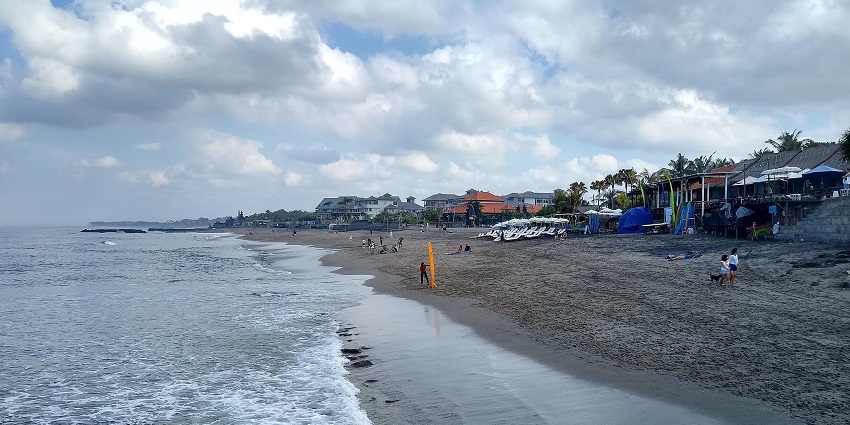 Witness dramatic sea temples and rock formations at the serene Mengening Beach.