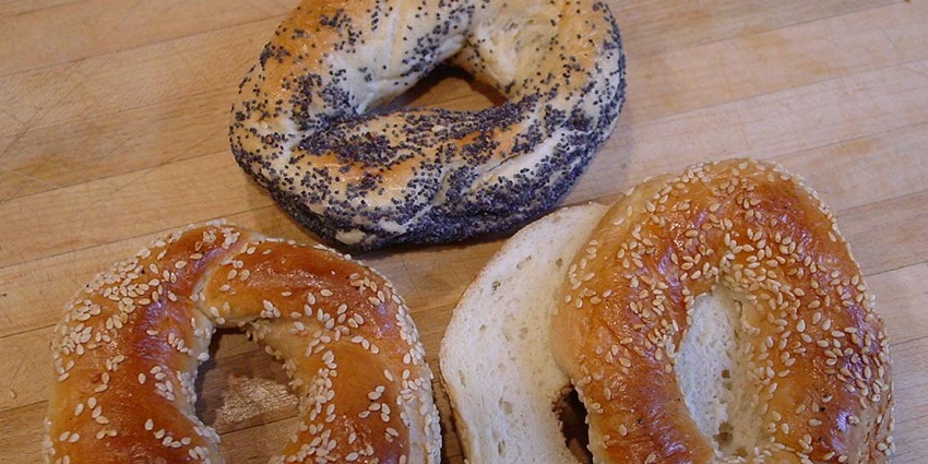 An Image of Golden, chewy Montréal-style bagels, the best street food in Canada.