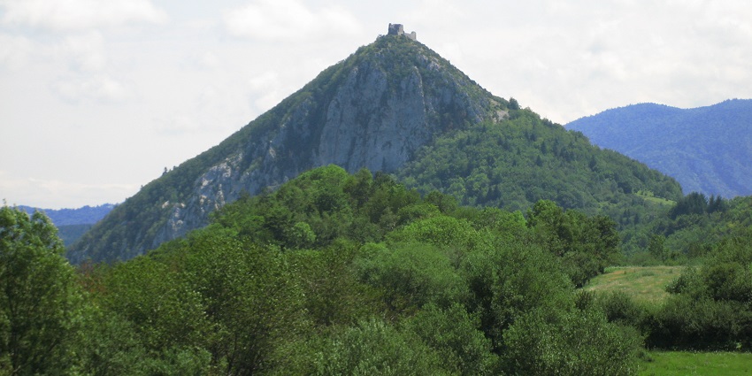 The ruins of Montségur Fort on a hilltop, a site for medieval fort treks in France.