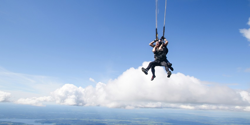Enjoy the thrill of skydiving in South Africa with views of the Indian Ocean and Mossel Bay.