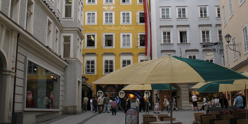 A yellow historic building in Salzburg, Austria, where Mozart was born