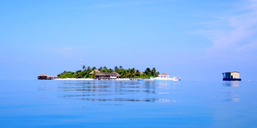 Dine at Muraka, an overwater restaurant blending Maldivian and international flavors with stunning ocean views.