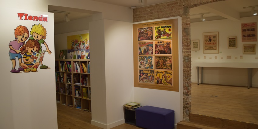 Inside Museo del Comic, the walls have posters and collages of famous cartoon characters pasted.