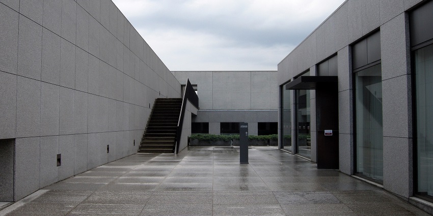 A serene photography museum highlighting the art and history of visual storytelling
