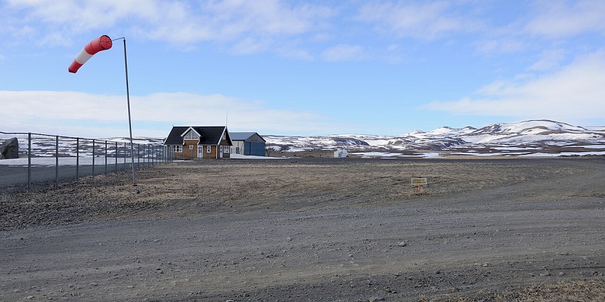 Mývatn Airport in Iceland is surrounded by distinctive volcanic landscapes and lava fields.