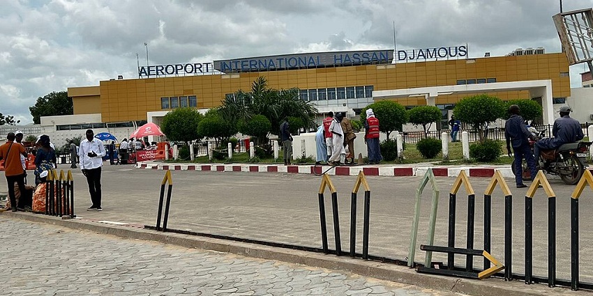 Terminal of N’djamena International Airport with yellow architecture and signage on top