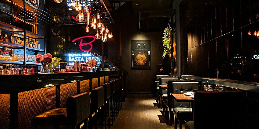 A stylish setting at Naga Bar, featuring beautiful decor and cocktails.