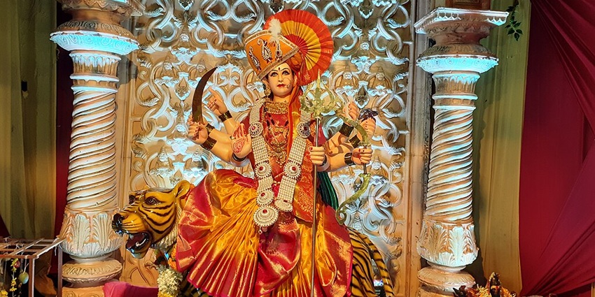 An image of Goddess Durga sitting on the tiger during the festival of Navratri, one of the best festivals in India