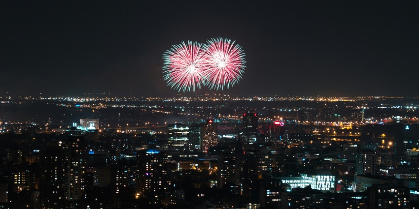 A nighttime view of New York City, one of the best places to visit for New Year’s Eve.