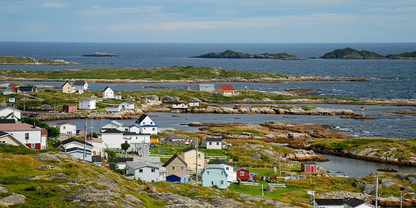 Newfoundland’s rugged coastal beauty, icebergs, and charming fishing villages in Canada.