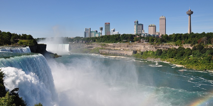 A world-famous natural wonder with three massive waterfalls spanning two countries.