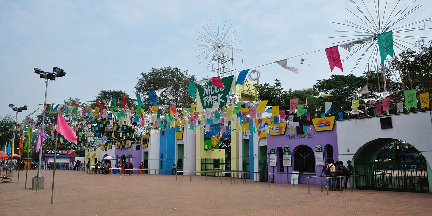 Visitors enjoy thrilling rides at an adventure park in Kolkata.