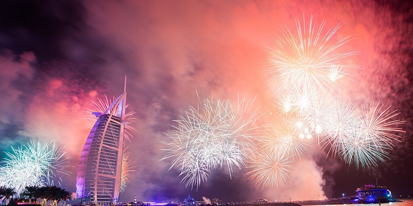 A nighttime view of Dubai, one of the best places to have New Year parties in resorts.