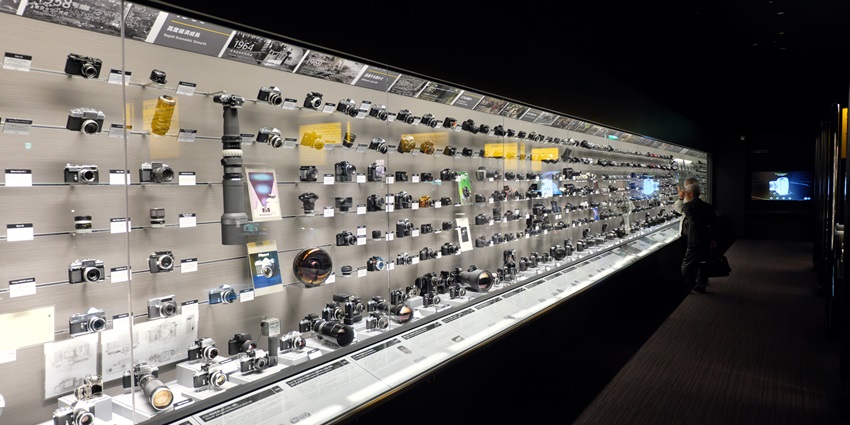 A collection of Nikon cameras at a leading Camera Museum, preserving photography heritage.