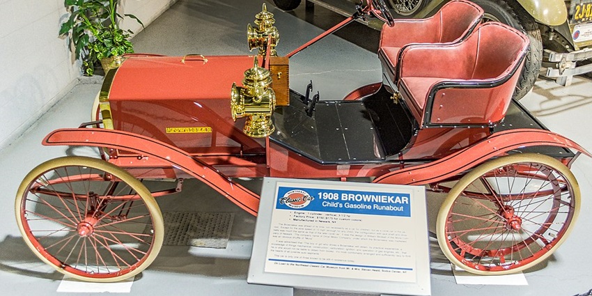 Image of a "Browniekar" cycle car in Northeast Classic Car Museum, a must-visit automobile museum.