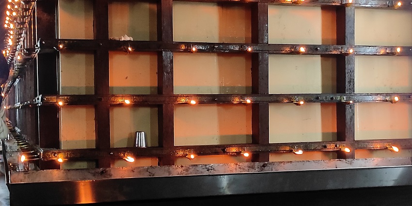 Offer flowers and light oil lamps, a significant tradition at Nagadeepa Purana Vihara.