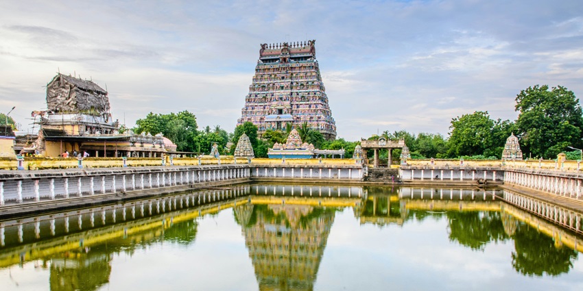 View of the Shani temple with a serene lake in the front