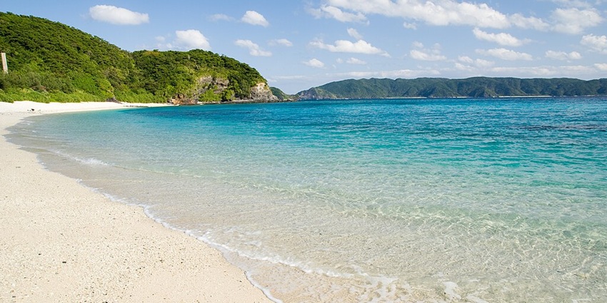 A beautiful island with turquoise waters, coral reefs, and a unique Ryukyuan culture
