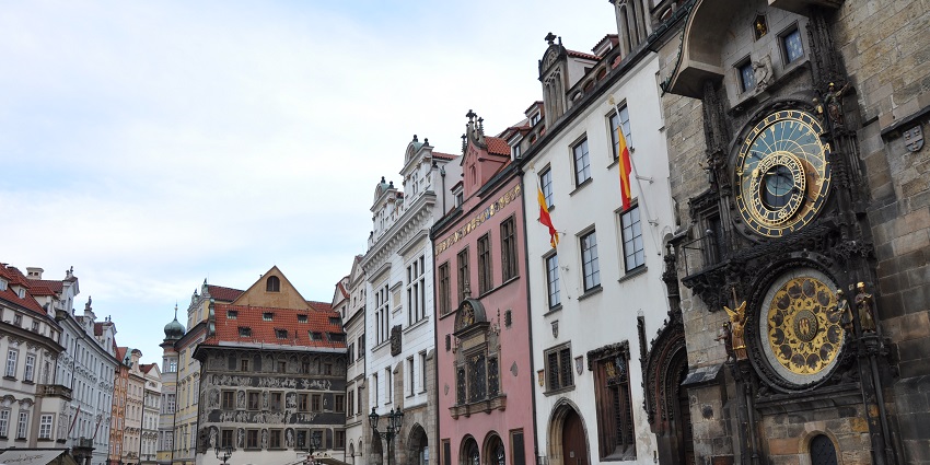 Old Town Square features the Astronomical Clock, surrounded by historic buildings