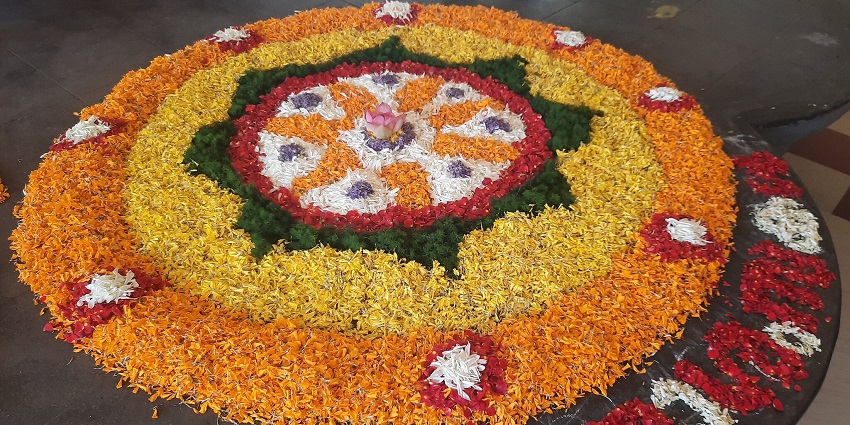 An image of a rangoli made during the Onam festival, one of the agricultural festivals in India.