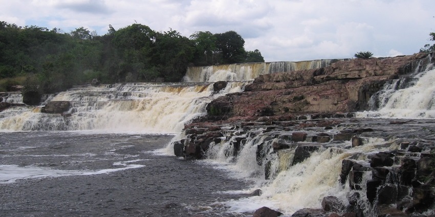 Relax in the natural rock pools beneath this scenic waterfall on the Guyana-Brazil border.