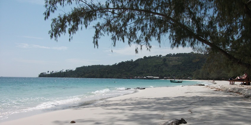 An image showing Koh Rong, Cambodia beach's long beach coastline and clear blue waters