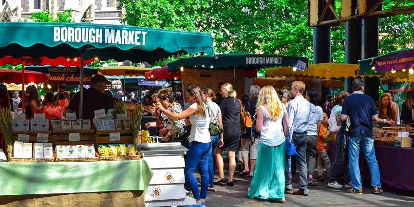 View of tourists strolling the Chatuchak Weekend Market in bright daylight