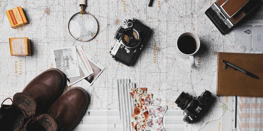 An image of travel items necessary for any trip for a seamless experience.