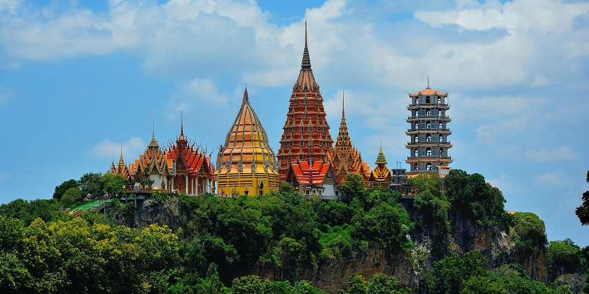 Iconic temples in Kanchanaburi, with scenic lush greenery surrounding