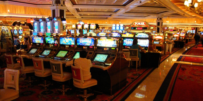 Slot machines lined up for gaming at the casino floor of the Wynn/Encore in Las Vegas