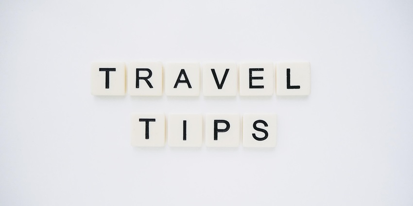 An image spelling 'TRAVEL TIPS' on background, suggesting helpful advice for travellers