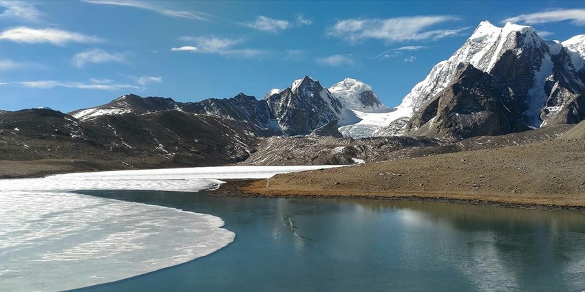 Panoramic view of snowed Gurudongmar Lake in December.