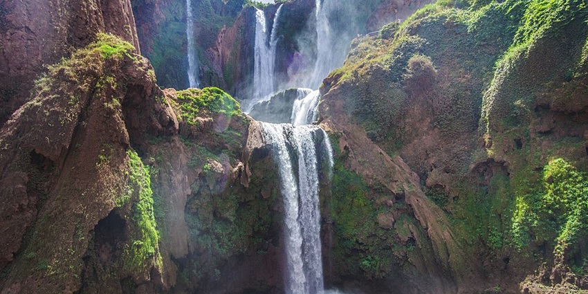 A spectacular Moroccan waterfall is among the best waterfalls in Africa, featuring multi-tiered cascades and friendly Barbary macaques.