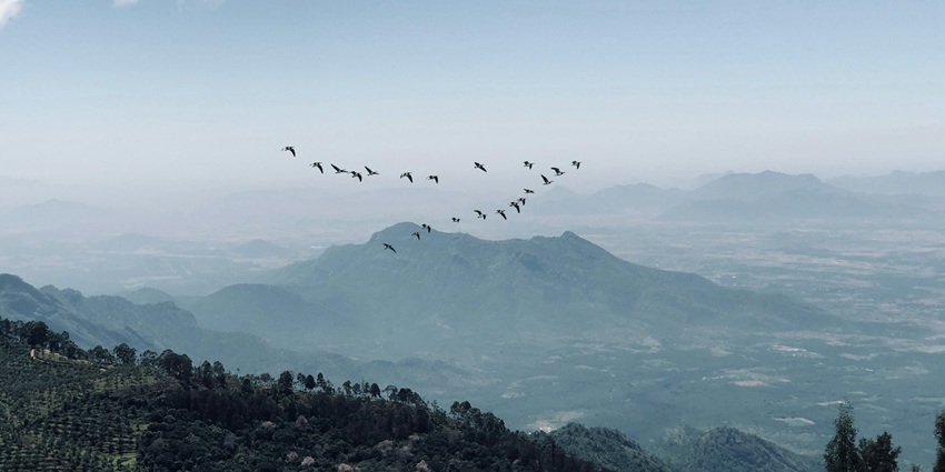 An image showing mountains and sky, like famous hill stations in Eastern Ghats.