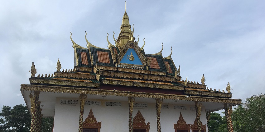 An image with intricate architectural details showing Wat Leu Temple.