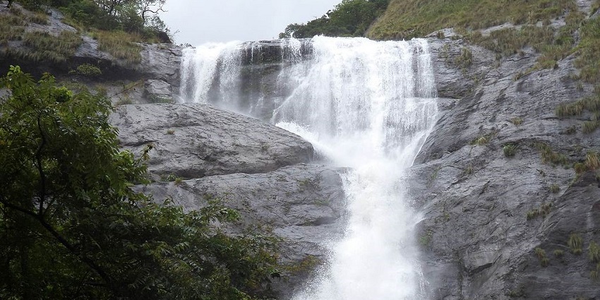 Palaruvi Waterfalls, a scenic jewel near Sasthamkotta Lake, the queen of lakes in India.