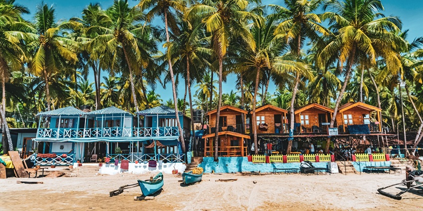 A serene view of Palolem Beach, one of the best places for camping in Goa, India.