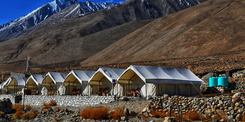 An image of aerial views of the tourist camps next to Pangong Lake, one of the camping places in India